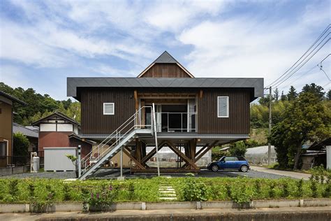 house designs on stilts with metal roof and deck|stilt house construction.